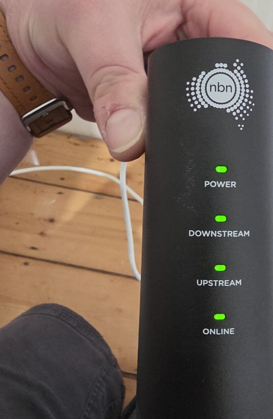 An nbn HFC connection box, a black ARRIS unit with POWER, DOWNSTREAM, UPSTREAM and ONLINE labels